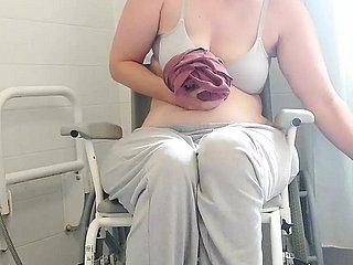 Paraplegic brunette Purplewheelz British milf peeing everywhere a difficulty shower