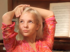 cute russian teen monroe effectuation piano with an increment of herself